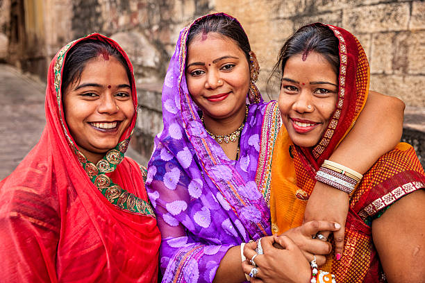 Portrait of young Indian women Jodhpur, India Portrait of young Indian women, Jodhpur. Jodhpur is known as the Blue City due to the vivid blue-painted houses around the Mehrangarh Fort.  hinduism photos stock pictures, royalty-free photos & images