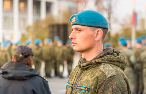 Portrait of young soldier of Special Armed Forces Russian military with blue beret on the square of Pskov, Russia Pskov, Russian Federation - May 4, 2018: Portrait of young soldier of Special Armed Forces Russian military with blue beret on the square of Pskov, Russia pskov russia stock pictures, royalty-free photos & images