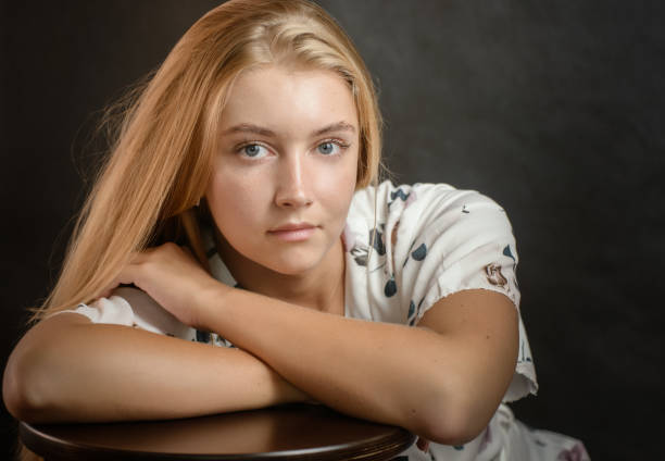 Portrait of young woman with blue eyes. stock photo