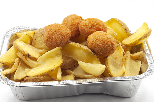 .portion of chips with meatballs .