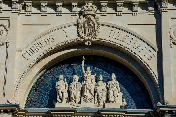 Post and telegraph building (Oficina de Correos) Valencia, Spain. February 5, 2019. Sculptures on Post and telegraph building (Oficina de Correos) near Town Hall Square oficina stock pictures, royalty-free photos & images
