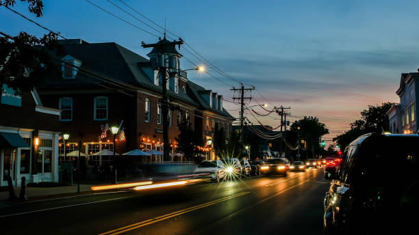 Post Road traffic with evening lights and beautiful colors from sunset on sky stock photo