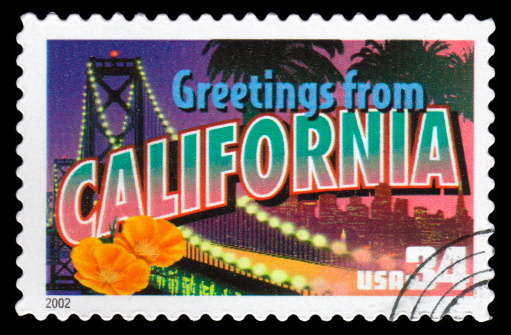 USA postage stamp Greetings From California showing the Golden Gate Bridge and the California Poppy