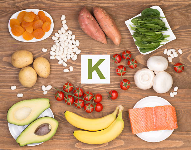 Potassium containing foods Various food containing potassium on wooden table, top view potassium stock pictures, royalty-free photos & images
