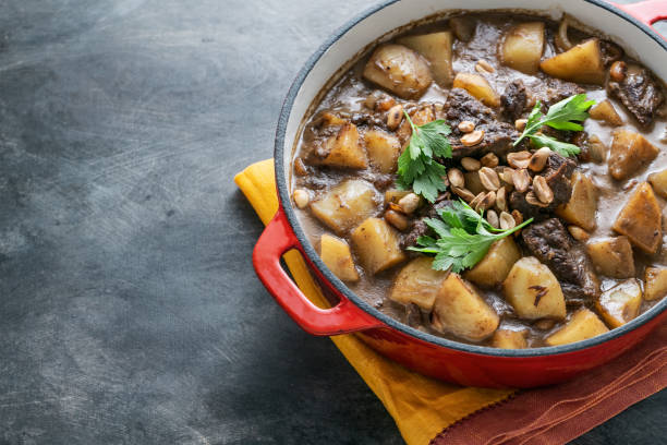 Potato and beef stew in spicy coconut gravy, thai cuisine, copy space stock photo
