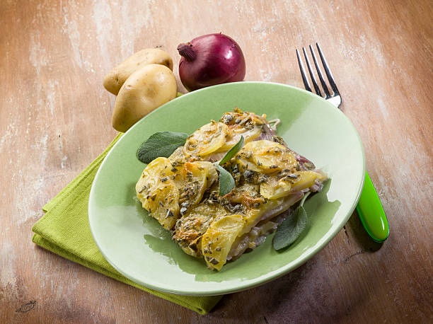 potatoes flan with onion and sage stock photo