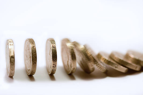 Pound coin dominoes stock photo