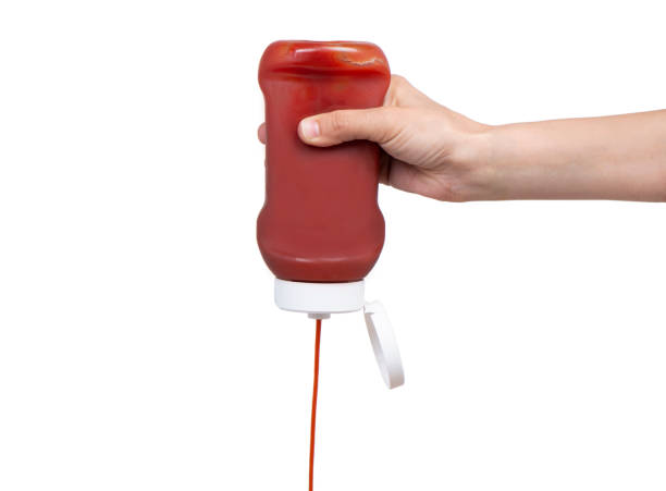 Pouring Ketchup stock photo