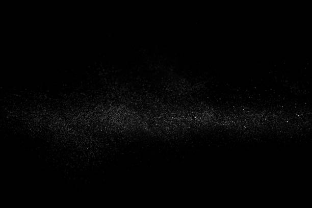 glitter in polvere su sfondo nero per sovrapposizione - dust foto e immagini stock