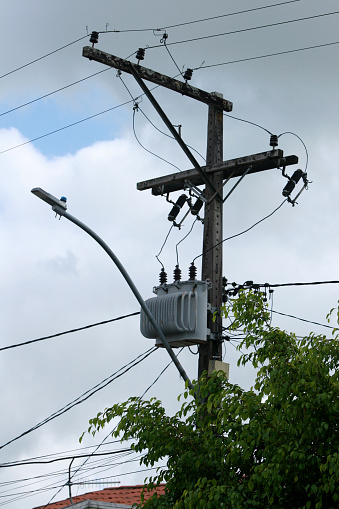 feira de santana, bahia, brazil - may 6, 2022: Electric network transformer is seen on a pole in the city of Feira de Santana.