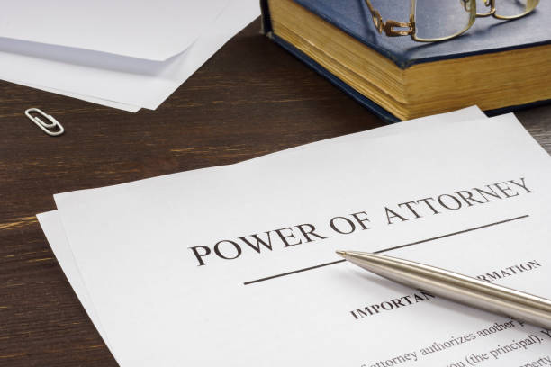 Power of attorney POA legal document and pen. stock photo