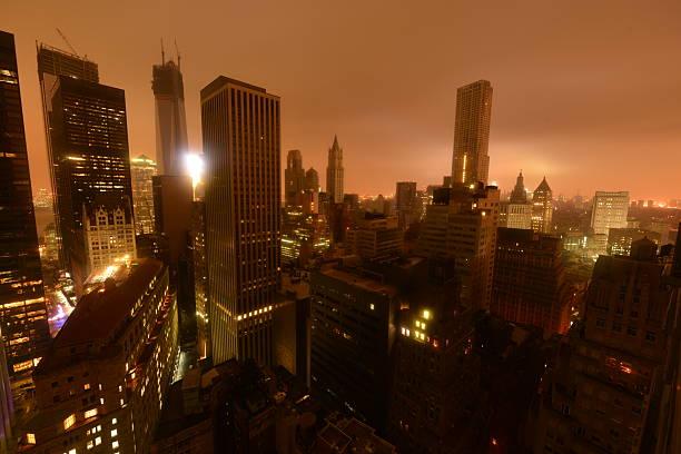 A power outage plunges lower Manhattan into darkness stock photo