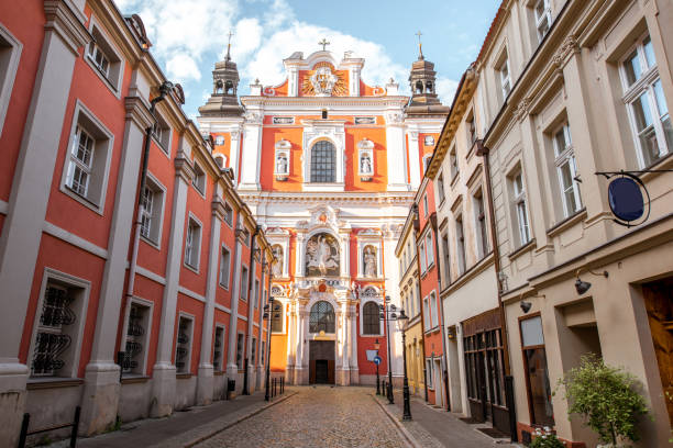 Poznan city in Krakow View on the facade of the Fara church in Poznan, Poland poznan stock pictures, royalty-free photos & images