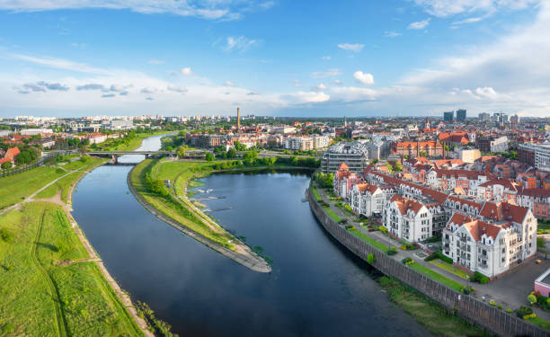 Poznan, Poland. Aerial view of Old Port district Poznan, Poland. Aerial view of Warta river and residential buildings in the district of Old Port poznan stock pictures, royalty-free photos & images
