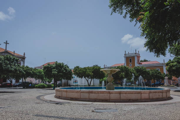 Praça Alexandre Albuquerque park in the capital city of Praia on Cabo Verde islands and beautiful fountain on a warm summer day. stock photo