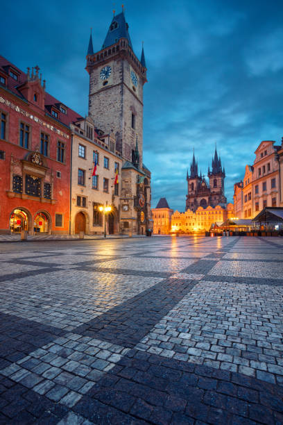 Prague, Czech Republic. Cityscape image of famous Old Town Square with the Prague Astronomical Clock and Old Town Hall during twilight blue hour. prague old town square stock pictures, royalty-free photos & images