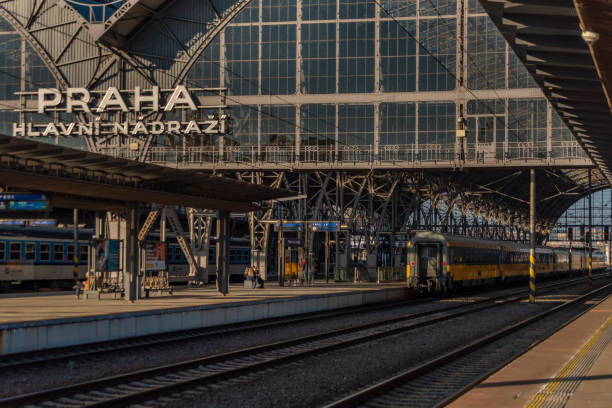 Prague main station in sunny winter evening with trains stock photo