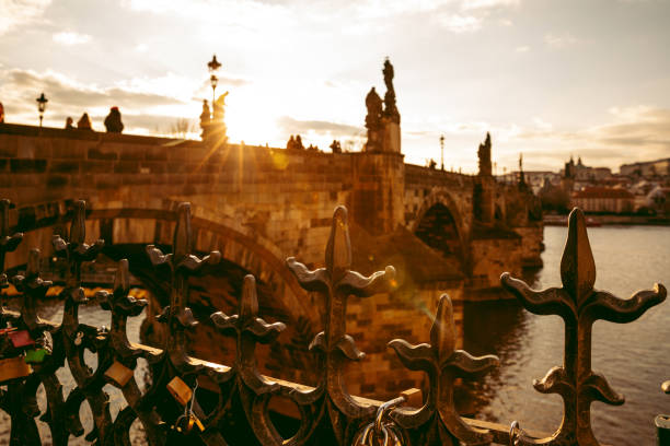 Prague Sunflare San Carlo Bridge And Moldava River stock photo
