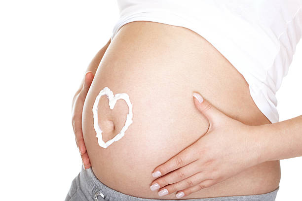 Pregnant belly stock photo