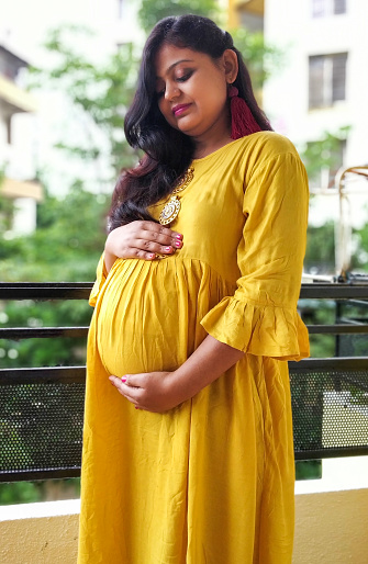 Pregnant Indian Woman Baby Shower Photo Shoot Poses Stock Photo ...