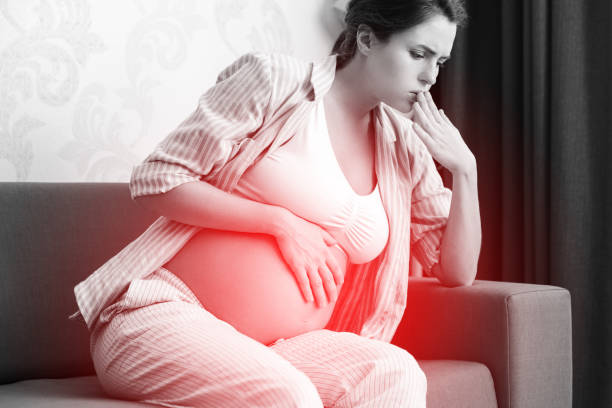 Pregnant woman at home feels sick Pregnant woman at home feels sick. Different health problems during pregnancy. depression  delivery stock pictures, royalty-free photos & images