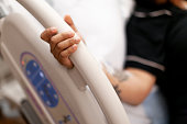 istock Pregnant Woman Holding side of hospital bed in painful contractions before labor 1318243396