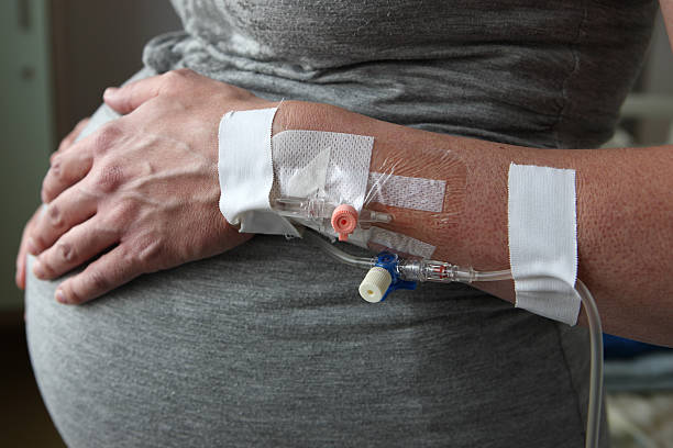 Pregnant Woman Intravenous Blood Infusion stock photo