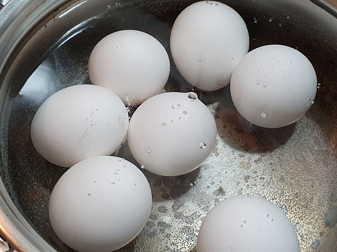 seven eggs in the pan