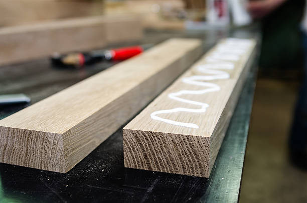 Preparing wooden surfaces for bonding. Joiner's shop stock photo