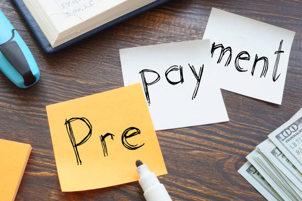 Prepayment is shown on the business photo using the text stock photo