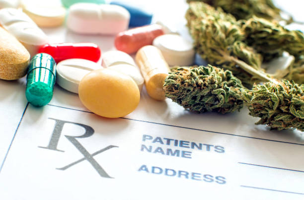Prescription pills with medical cannabis and prescription paper stock photo
