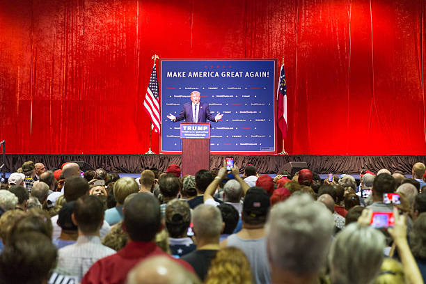 Presidential Candidate for 2016 Elections Donald Trump Norcross, GA, USA - October 10, 2015: Presidential candidate and Republican party nominee Donald Trump giving a speech at a rally in Georgia donald trump stock pictures, royalty-free photos & images