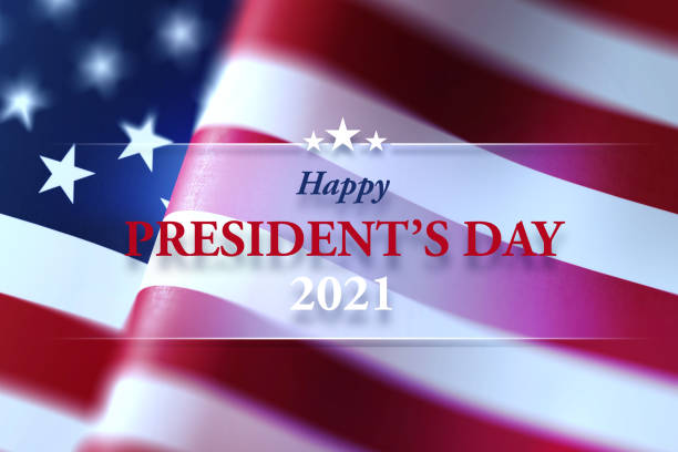 Happy President's Day message written over waving American flag with selective focus. Horizontal composition with copy space. Front view. USA President's Day concept.