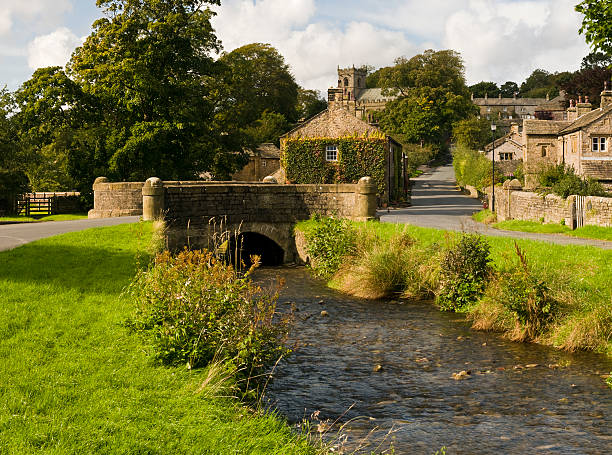 Pretty English village The beautiful English village of Downham in the Ribble valley in Lancashire.Similar images lancashire stock pictures, royalty-free photos & images