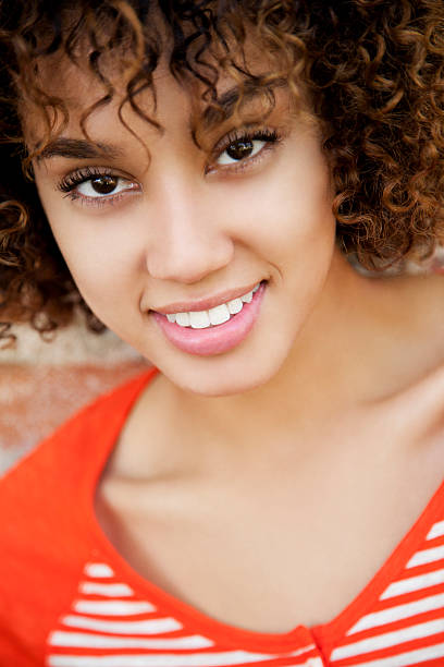 Pretty woman smiling Ethnic woman with curly hair posing with new clothes and smiling. cute puerto rican girls stock pictures, royalty-free photos & images