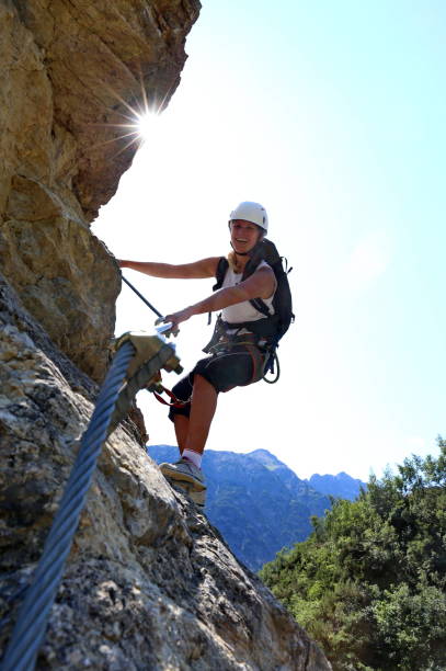Pretty young woman in via ferrata at Simms waterfall Sport, Adventure, outdoors, leisure lechtal alps stock pictures, royalty-free photos & images