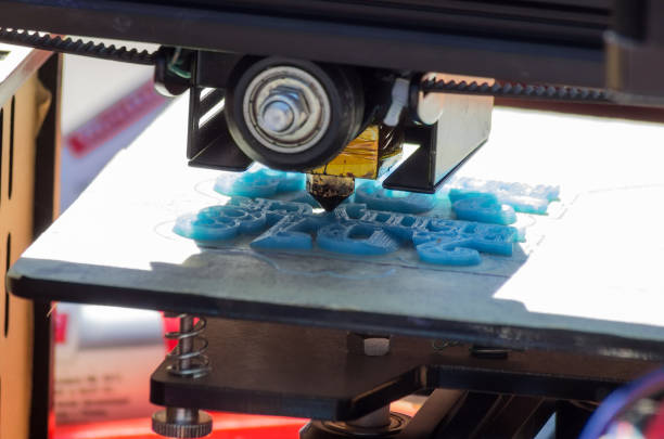 3D printer in operation, close-up stock photo