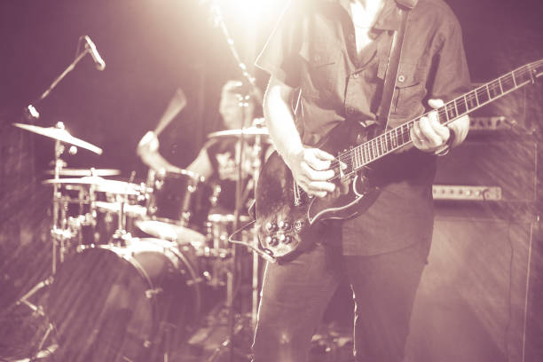 pro guitarist in concert stock photo