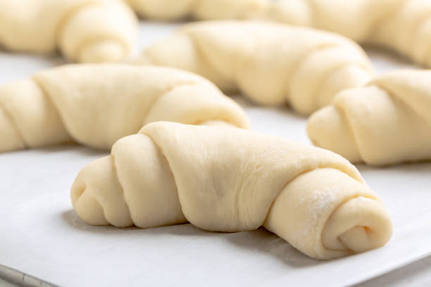 Process of making crescent rolled buns. stock photo