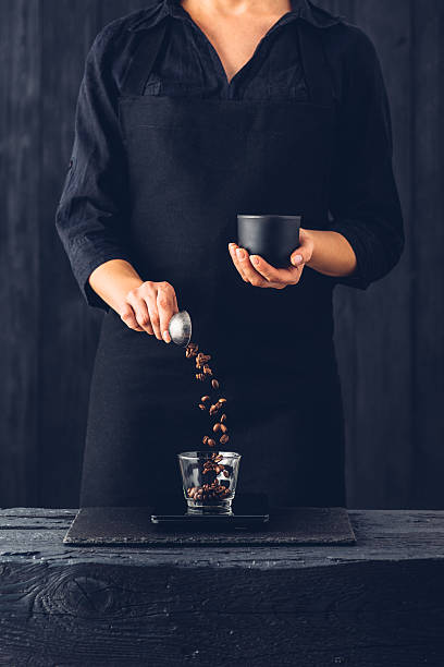 Professional barista preparing coffee alternative method stock photo