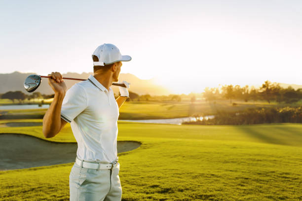 プロゴルファーでゴルフ コース - ゴルフ　服装 ストックフォトと画像