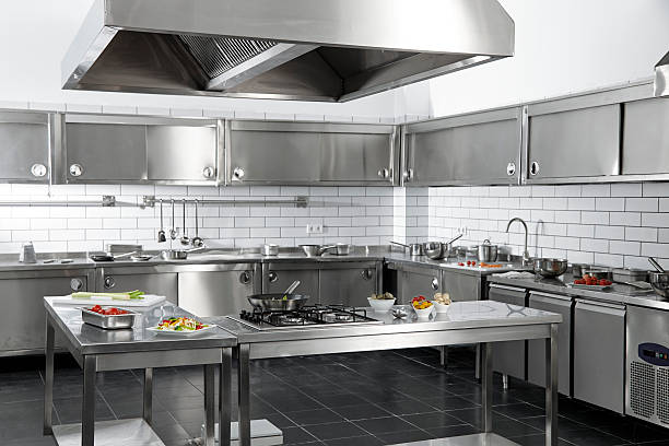 Professional Kitchen Empty professional kitchen commercial kitchen stock pictures, royalty-free photos & images