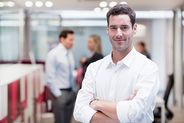 Professional looking business man posing for photo stock photo