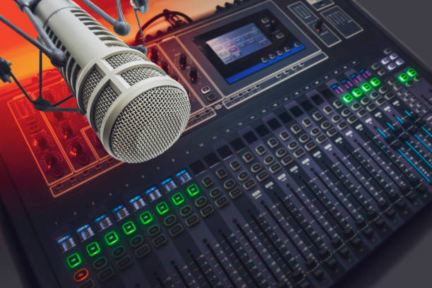 Professional microphone and audio mixer stock photo