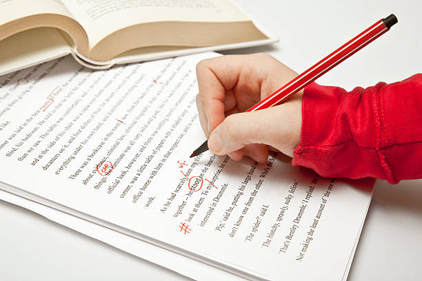 Proofreading services "Proofreader at work, working in a novel and using professional proofreader signs. Proofreading concepts Lightbox:" editorial photos stock pictures, royalty-free photos & images