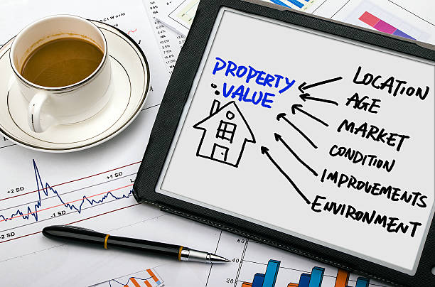 property concept hand drawing on tablet pc stock photo