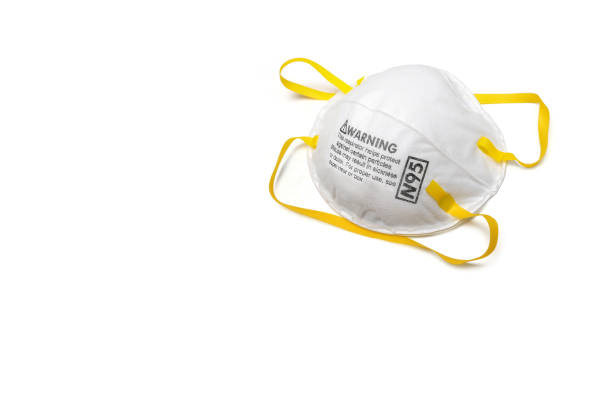 protection factor for N95, covid-19, corona virus Filtering face mask protection factor for N95 Filtering face mask-safety white mask on white background n95 mask stock pictures, royalty-free photos & images