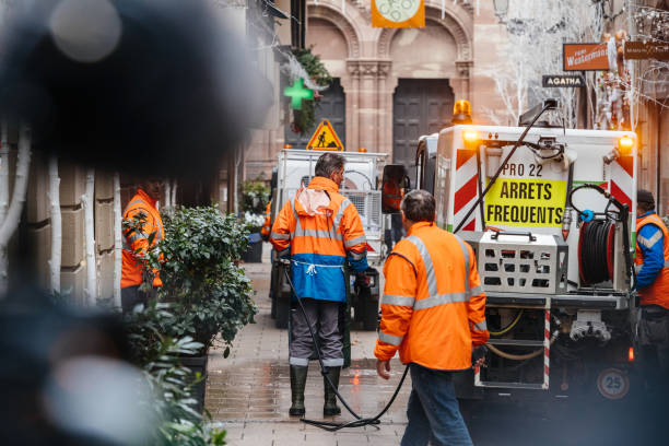 Public services sweeper van cleaning blood traces after Strasbou STRASBOURG, FRANCE - DEC 11, 2018: Public services team cleaning bood traces of terrorist attacks on Rue des Orfevres a day after Cherif Chekatt killed at least two people and wounded 12 public service stock pictures, royalty-free photos & images
