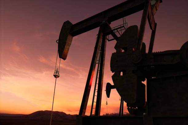 pump jack in an oil field stock photo