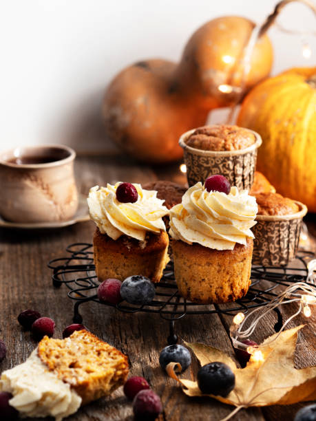 Pumpkin Cupcakes with Cream Cheese Frosting,Pumpkin Cupcakes,christmas food,christmas food Pumpkin, Cupcake, Dessert, Autumn, Elegance,blueberry,berry,christmas food,light,christmas lights,illuminate,Baked, Baked Pastry Item, Bakery, Cake,Bread, Breakfast,christmas food turkey cupcakes stock pictures, royalty-free photos & images